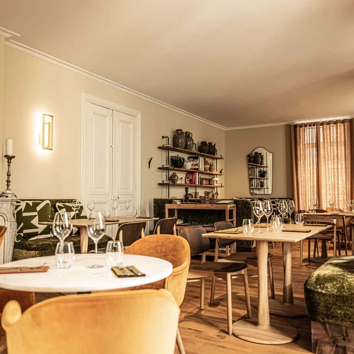 Interior of Restaurant Le Mosaïque, offering a cosy and sophisticated dining room atmosphere.